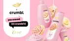Dove x Crumble pale pink products featuring a cookie with colourful sprinkles