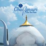 Logo for "Chai Bansuri The Tea Flute" by Taj Mahal over a cloudy sky with a large ornate white and gold teapot below.
